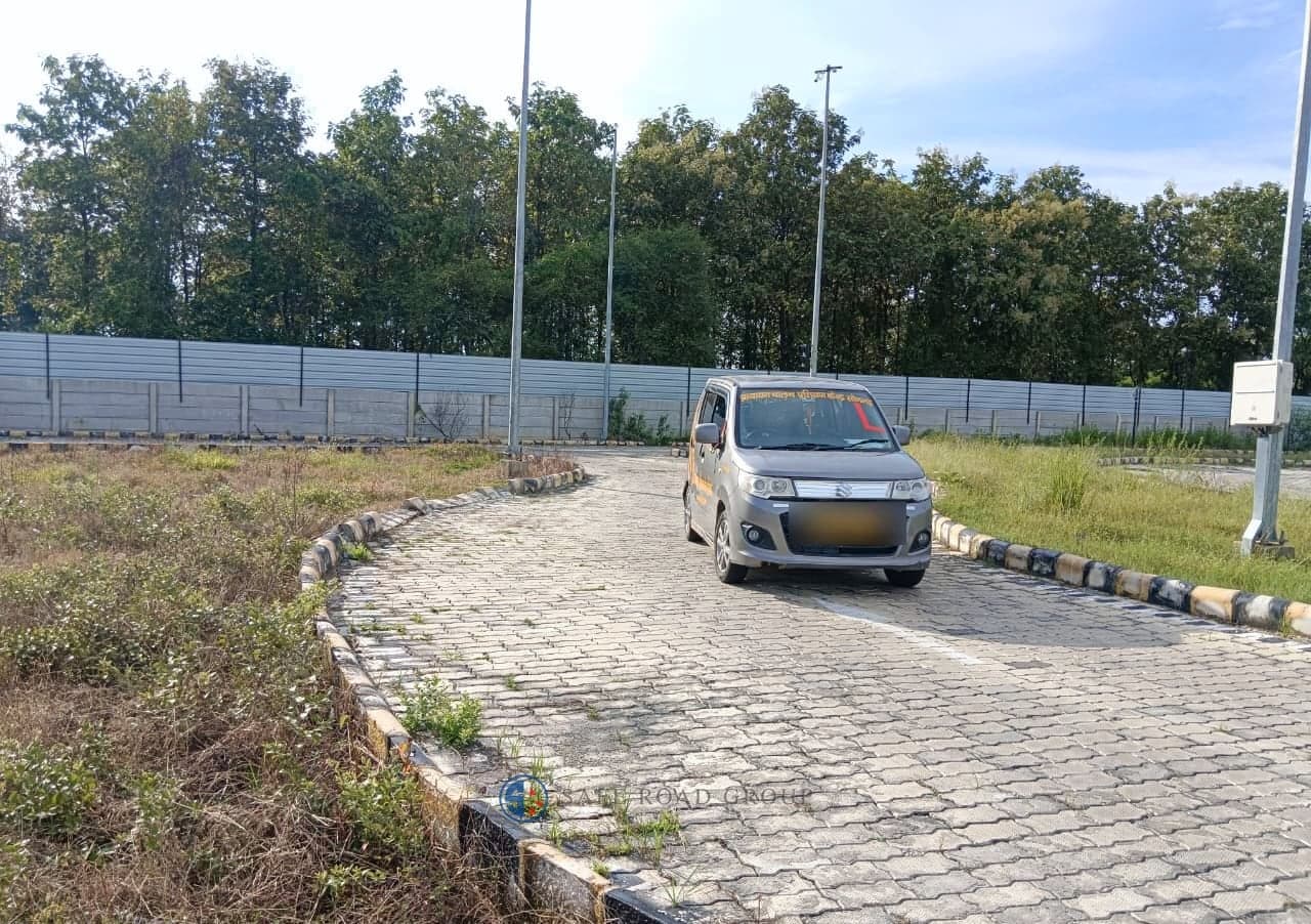 A learner car on the centre's circuit with the L plate up